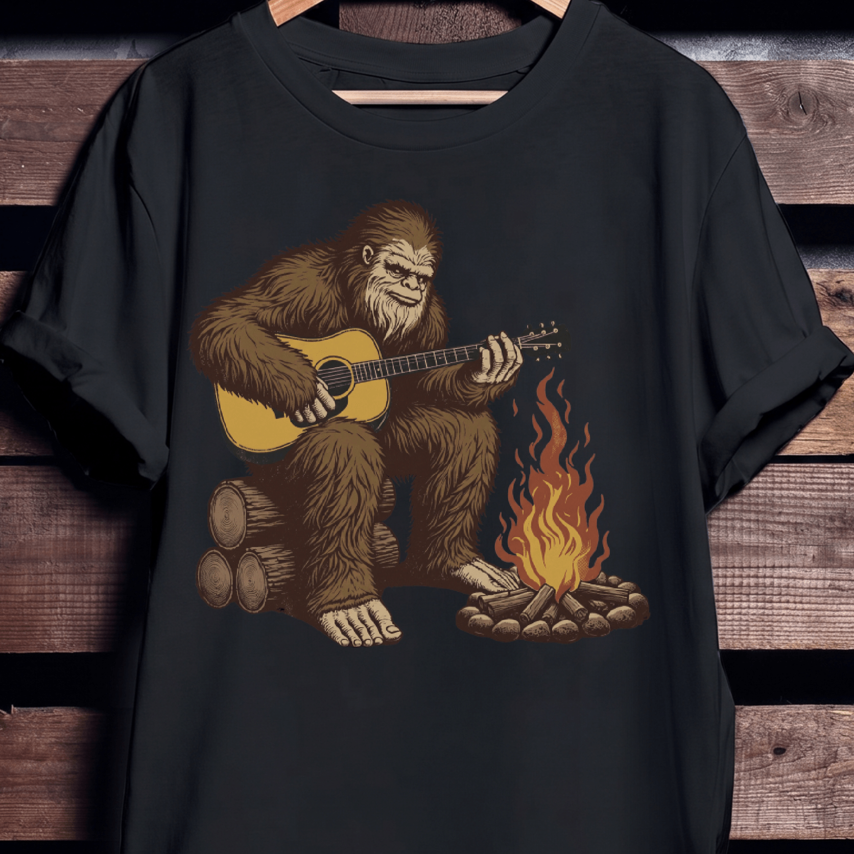 Bigfoot Sasquatch Playing Guitar by Campfire T-Shirt - The Music Frontiers