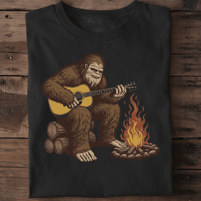 Bigfoot Sasquatch Playing Guitar by Campfire T-Shirt - The Music Frontiers