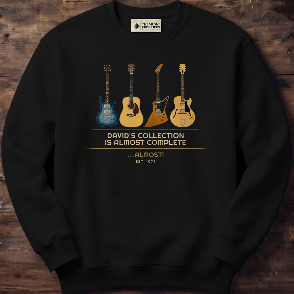 Black sweatshirt with the personalized My Collection Is Almost Complete Guitar design