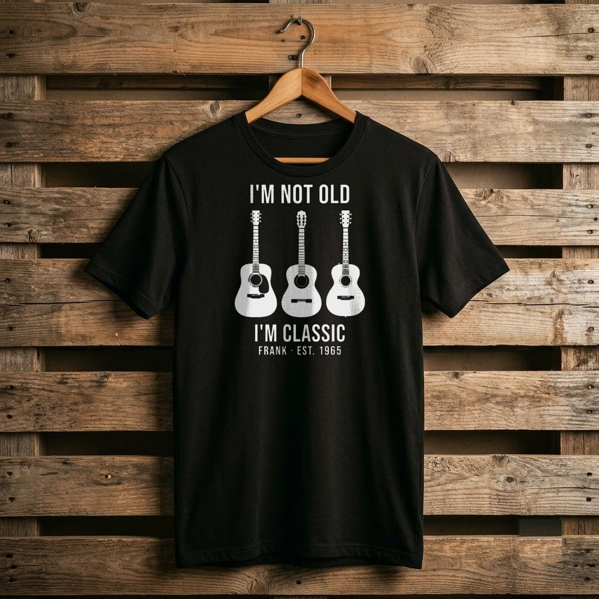 Black shirt reading I'm Not Old, I'm Classic with three white acoustic guitars and Frank EST 1965