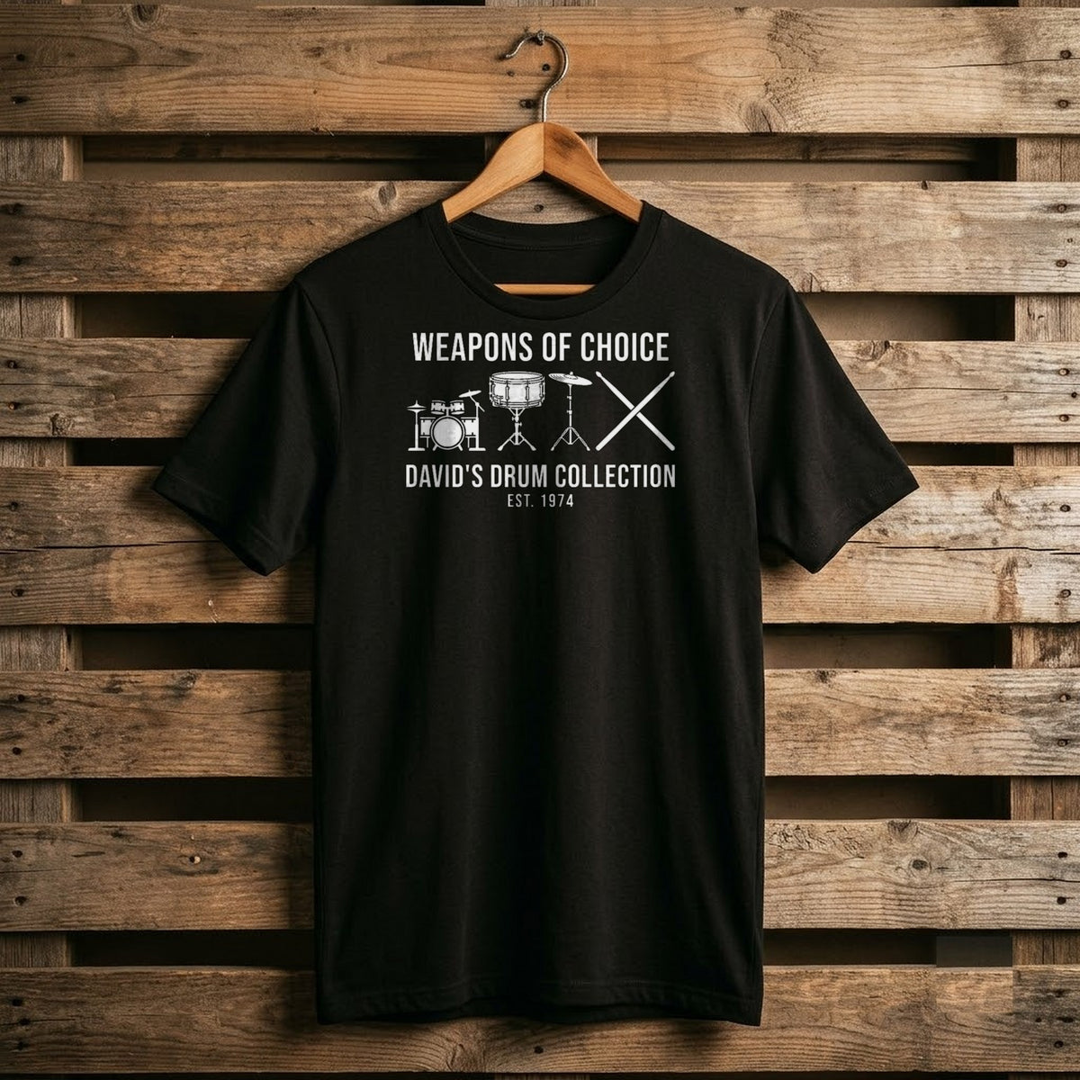 Black personalized drum collection shirt with white snare, cymbal and tom silhouettes