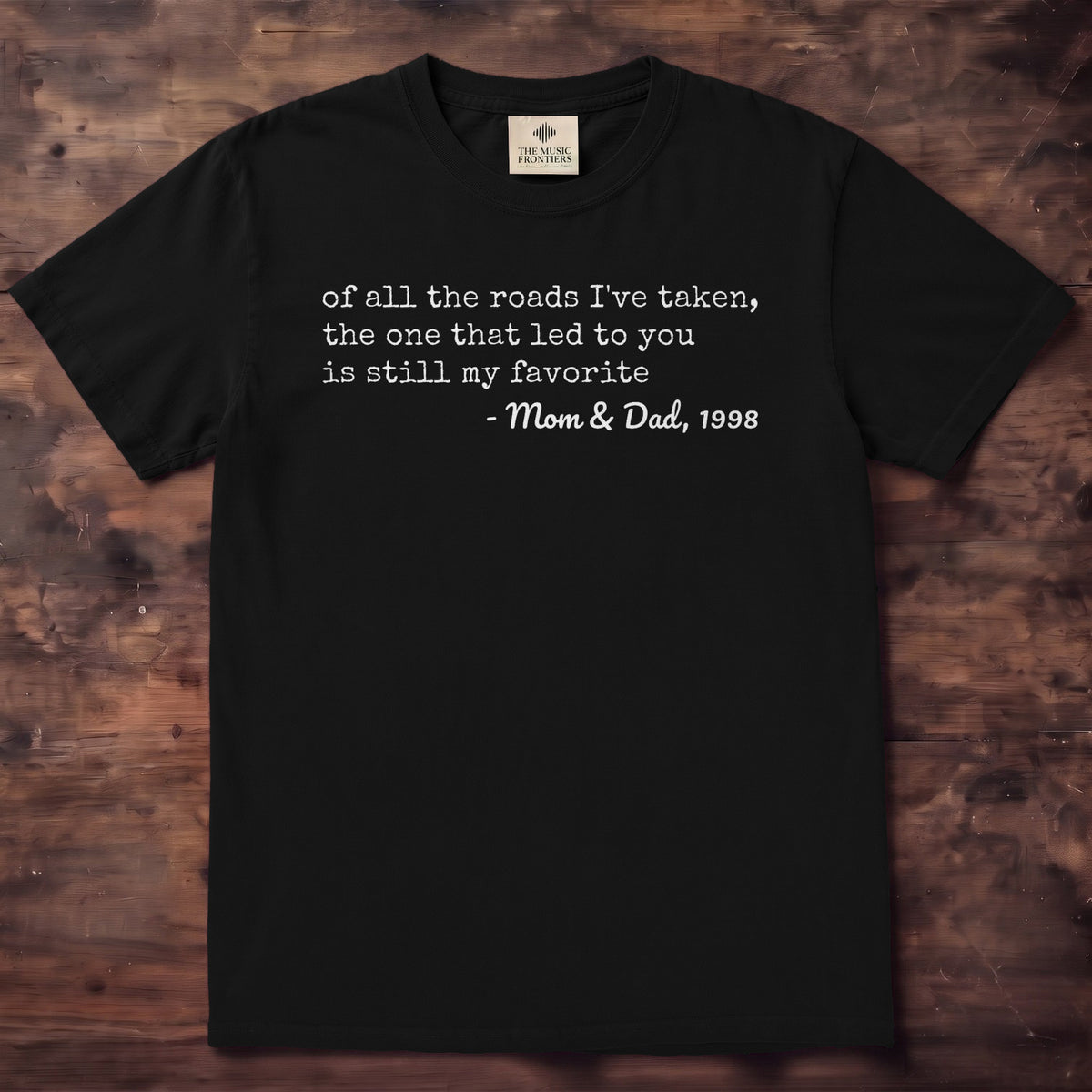 Blue Jean Comfort Colors tee with three lines of typewriter text and a handwritten signature, Mom & Dad 1998