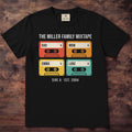 Black shirt with a grid of colorful cassette tapes labeled Dad, Mom, Emma and Luke under The Miller Family Mixtape