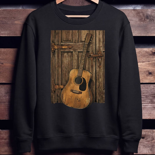 Rustic Vintage Guitar Against Door