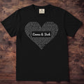Black tee with song lyrics filling a heart shape and the names Emma & Jack set large in the middle