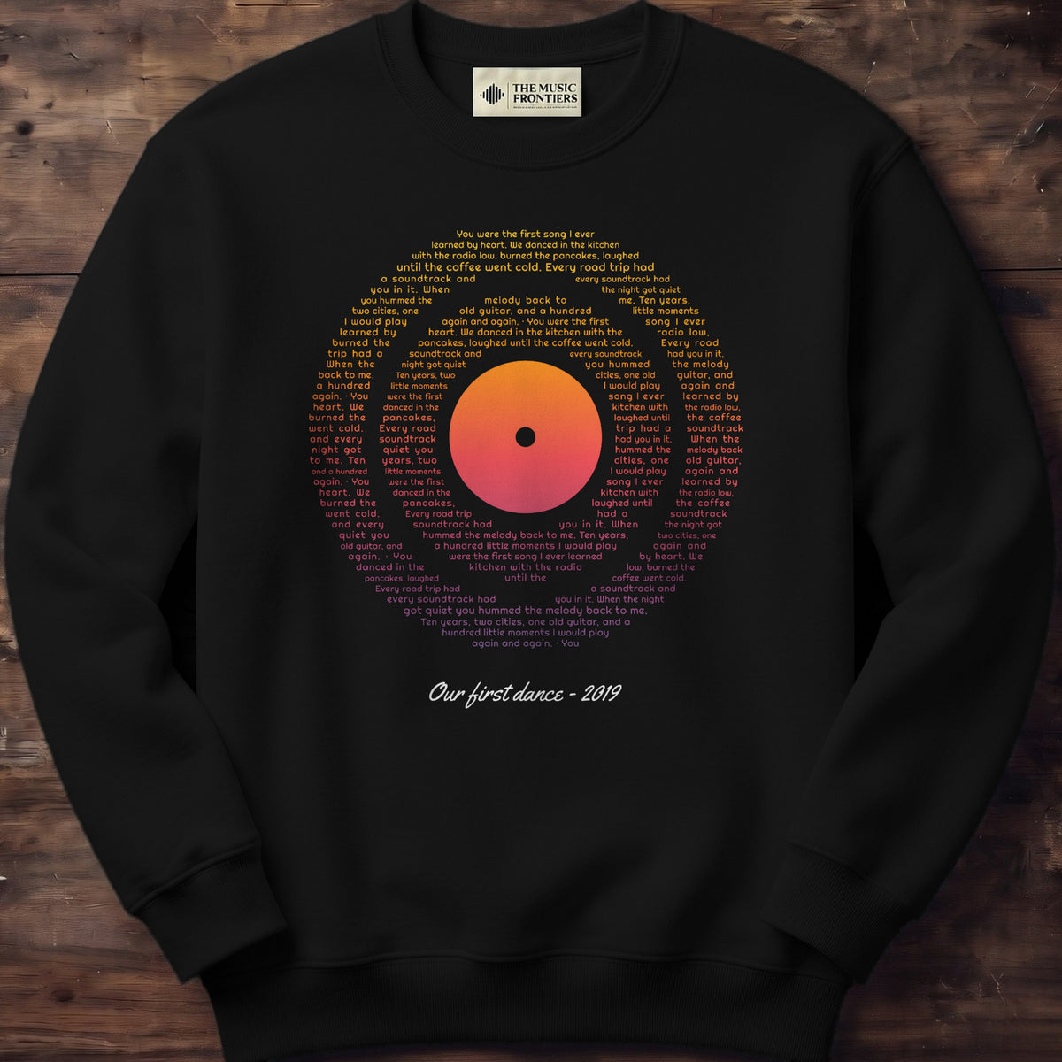 Black sweatshirt with the personalized Vinyl Record Sunset Lyrics design