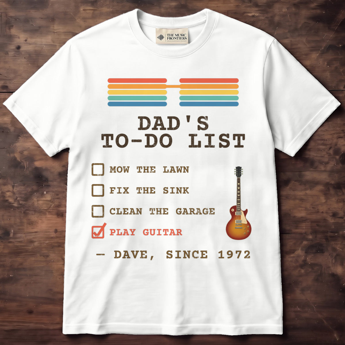 White t-shirt with the personalized Dad's To-Do List , Play Guitar Checked design
