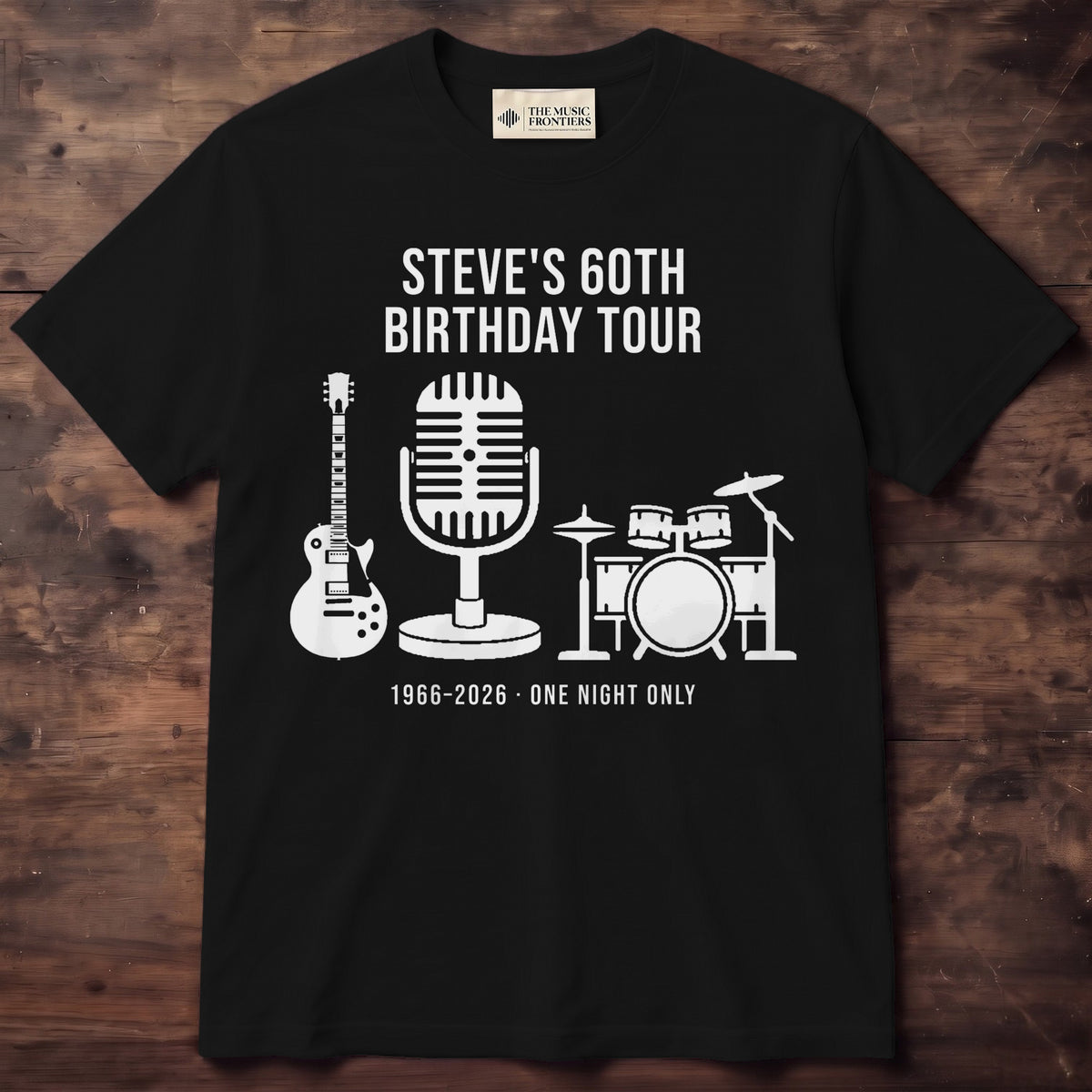 Black shirt reading Steve's 60th Birthday Tour with a guitar, microphone and drum kit and 1966 - 2026 One Night Only