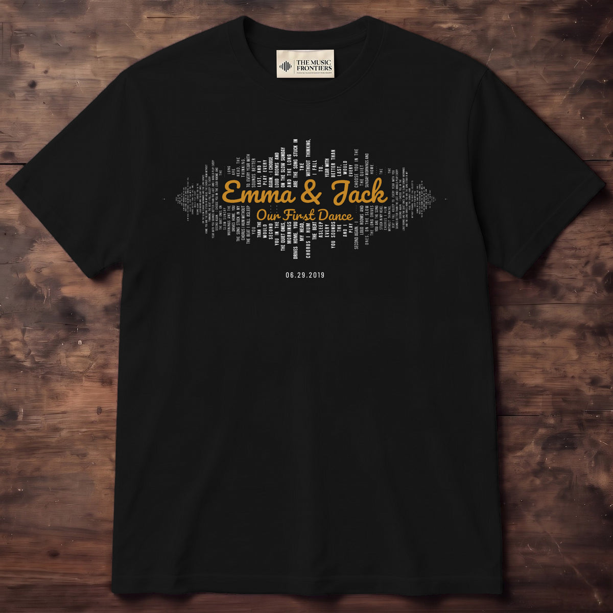 Navy tee with a sound wave of lyric lines and Emma & Jack handwritten across the middle