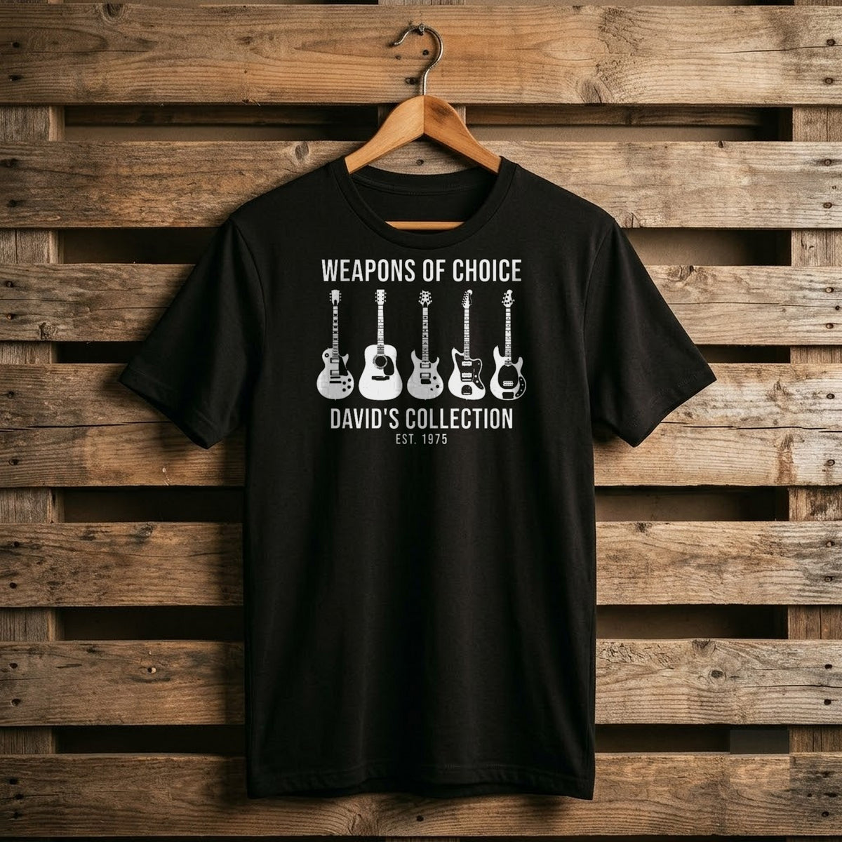 Black personalized Weapons of Choice shirt with a row of white guitar silhouettes, name and EST year