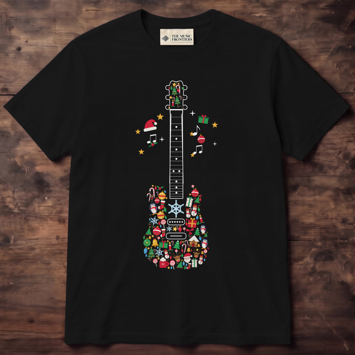Black shirt with a white line guitar neck and a body made of colorful Christmas icons, notes and Santa hats beside the neck